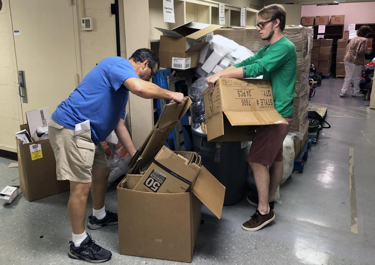 JULY 24 - PACK-A-THON DAY 2: About 30 volunteers joined us for Day 2. The day began quickly, with 700 backpacks being filled and staged for pickup by distributing groups. When the backpacks were finished, the voluteers boxed and stored remaining school supplies, disposed of an incredible amount of trash, and returned the School District's Family Resource Center to normal. Thank you to everyone who came out to make this a record-setting day for Stuff the Bus and the students of our community.