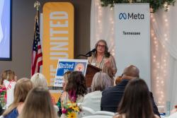 Connie Cude speaks at 2023 Community Impact Breakfast