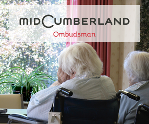 Two women in wheelchairs at nursing home