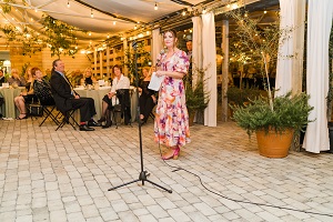 Erin Birch speaking to 2023 Gala crowd