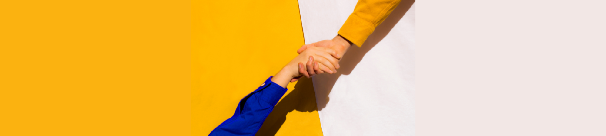 Somebody offering a hand to pull someone up